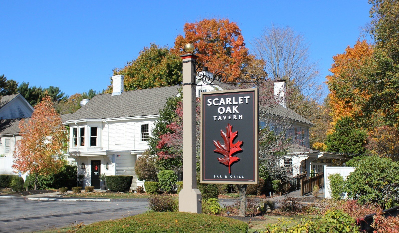 View of building from the outside with Scarlet Oak Tavern signage