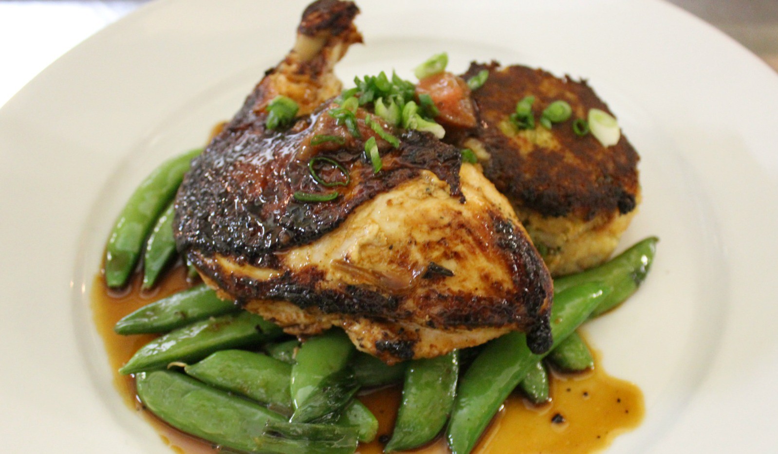 Roasted Chicken Breast served over snap peas